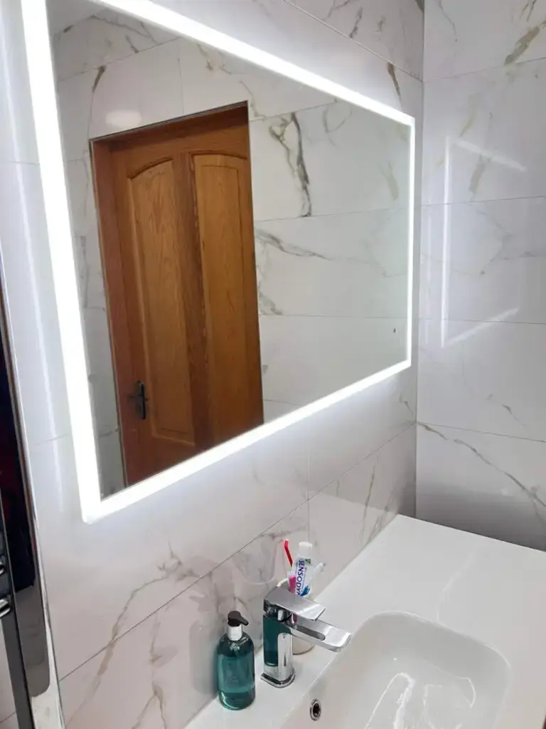 white-marble-tile-backlit-mirror-sink-basin